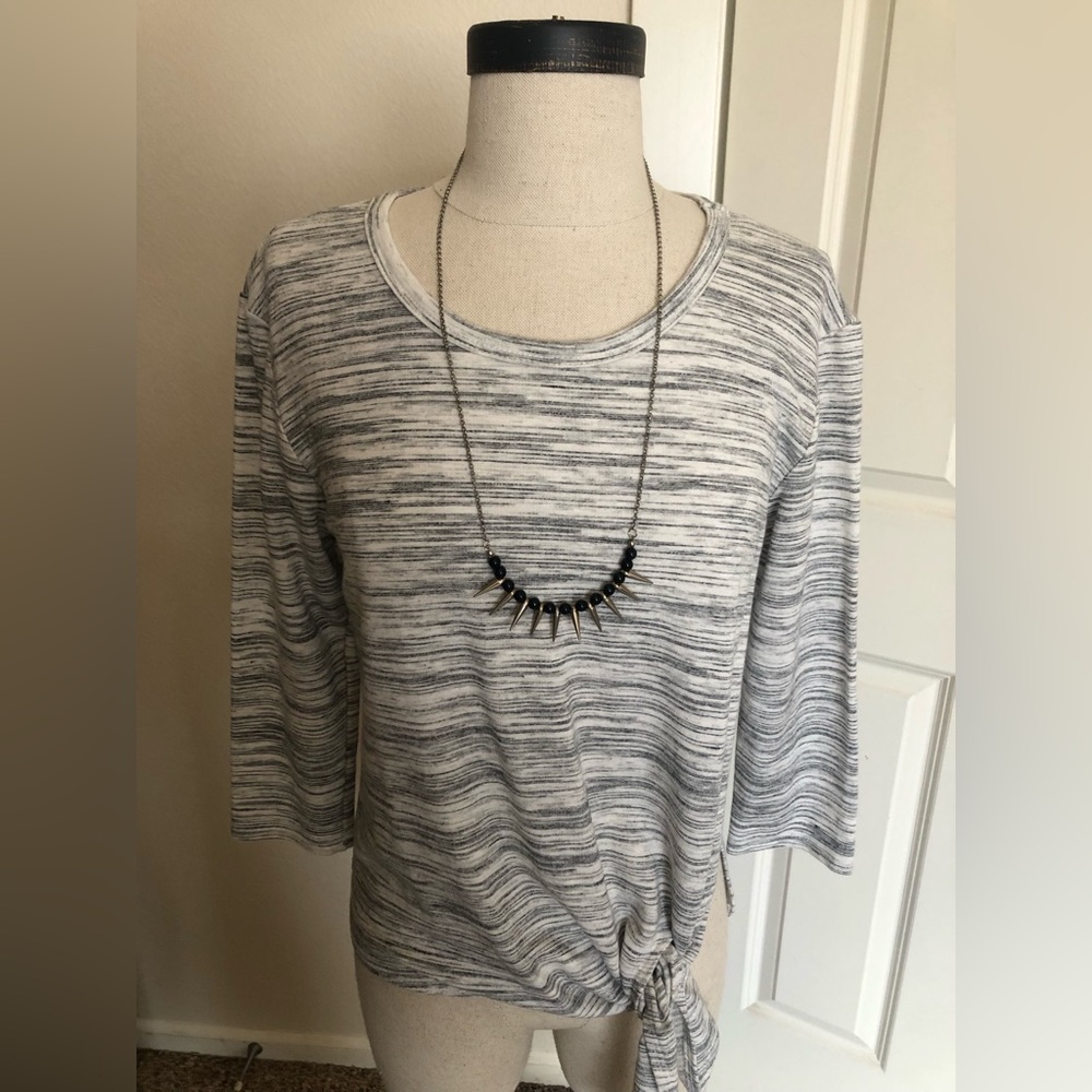Reposh item. Cute stretchy pullover with tie detail. Fits like a true small.